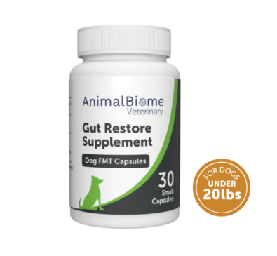 A white bottle labeled "AnimalBiome Veterinary Gut Restore Supplement Dog FMT Capsules" with 30 small capsules, for dogs under 20 lbs