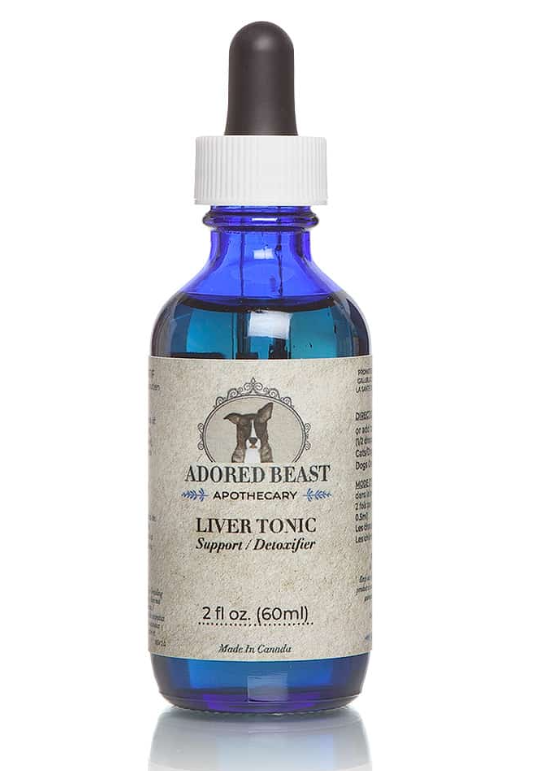 A blue bottle of Adored Beast Apothecary Liver Tonic Support/Detoxifier with a white dropper cap. The label features an illustration of a dog and reads 'Adored Beast Apothecary Liver Tonic Support/Detoxifier.' The bottle contains 2 fl oz (60 ml) of the liquid product and indicates it is made in Canada